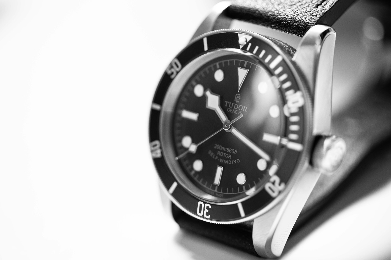 close up, black and white image of a Black Bay watch from TUDOR